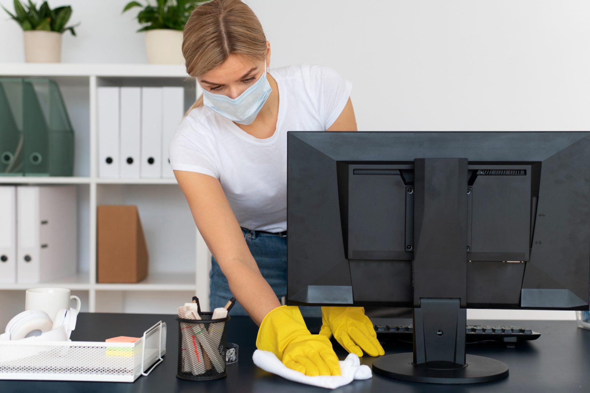 person-taking-care-office-cleaning